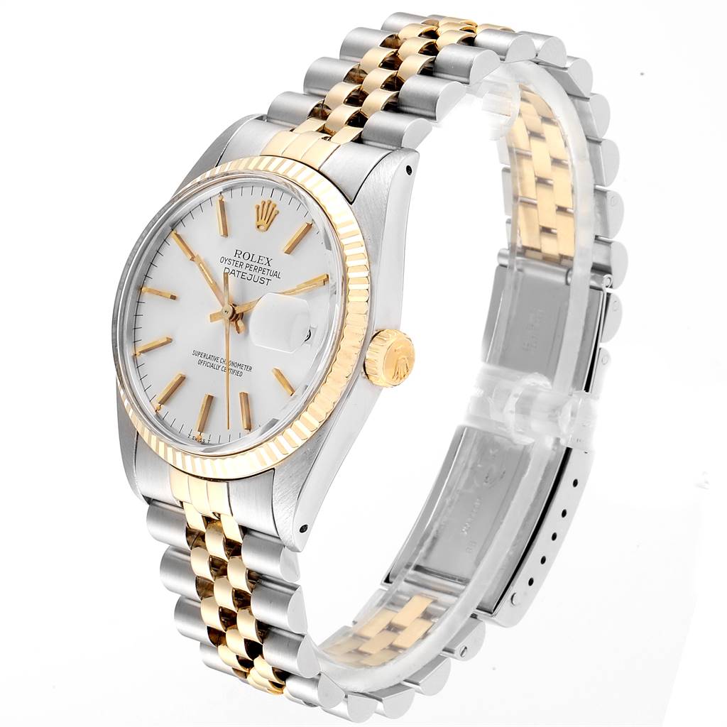 The Rolex Vintage Collection 16013 Men
s Stainless Steel Silver Dial 16013 Men
s Stainless Steel Silver Dial model watch is shown from an angle displaying its face, crown, and two-tone metal bracelet.