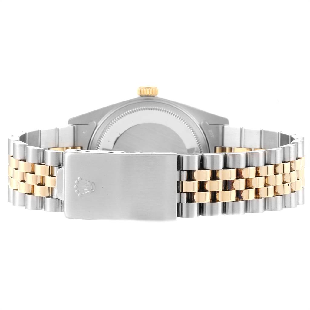 The image shows the back view of the Rolex Vintage Collection 16013 Men
s Stainless Steel Silver Dial 16013 Men
s Stainless Steel Silver Dial model, highlighting the two-tone metal bracelet and clasp.