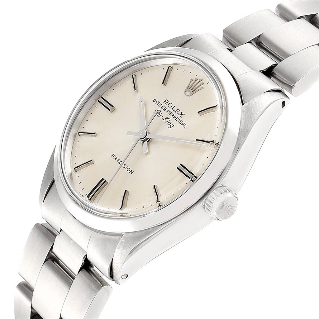 The image shows a close-up angled view of the face, crown, and part of the bracelet of a Vintage Collection Rolex Oyster Perpetual Air-King watch.