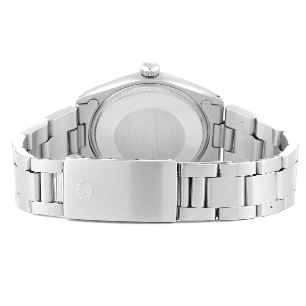 The image shows the back view of the Rolex Vintage Collection 5500 Men's Stainless Steel Silver Dial 5500 Men's Stainless Steel Silver Dial watch, highlighting the case back and metal bracelet.