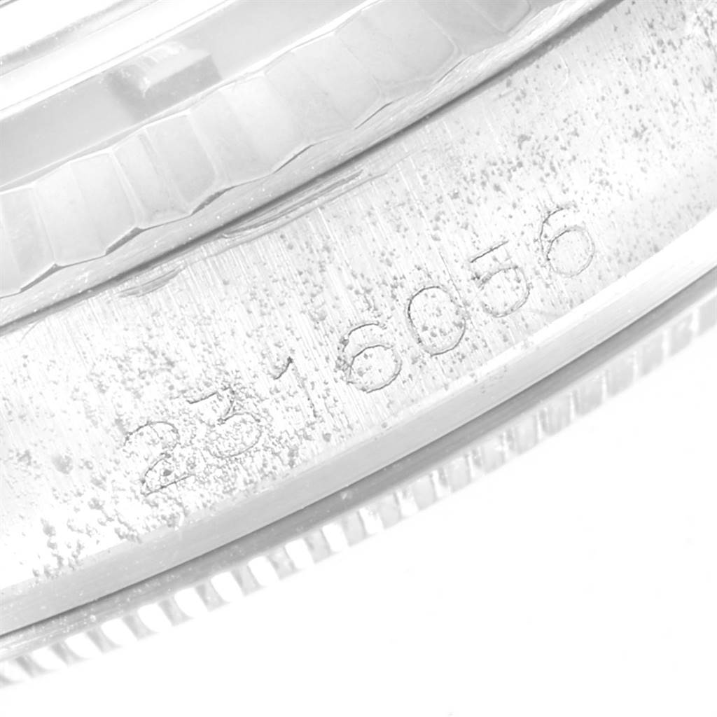 This image shows a close-up of the outer case edge of a Rolex Vintage Collection 1601 Men's Stainless Steel Grey Dial 1601 Men's Stainless Steel Grey Dial watch, featuring its serial number.