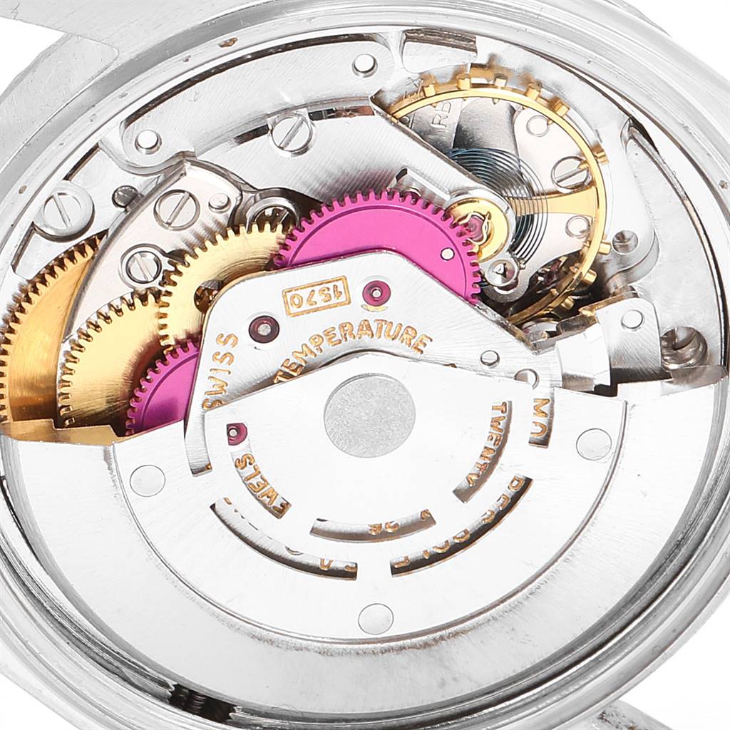 The image shows a close-up angle of the internal mechanical movement of a Rolex Vintage Collection 1601 Men's Stainless Steel Grey Dial 1601 Men's Stainless Steel Grey Dial watch.