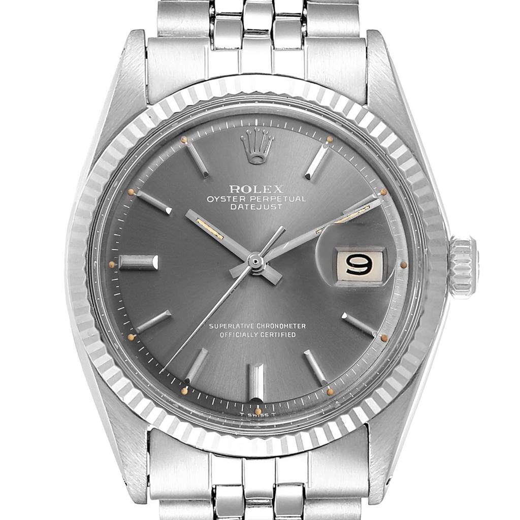 The image shows the front view of a Rolex Vintage Collection 1601 Men's Stainless Steel Grey Dial 1601 Men's Stainless Steel Grey Dial Oyster Perpetual Datejust watch, displaying its face, bezel, crown, and part of the bracelet.