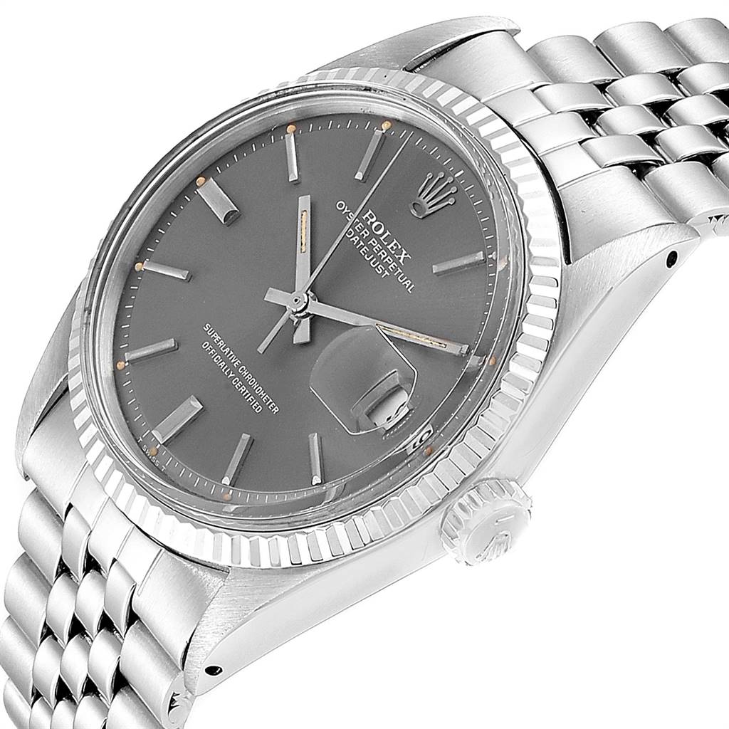 This image shows a close-up angled view of the Rolex Vintage Collection 1601 Men's Stainless Steel Grey Dial 1601 Men's Stainless Steel Grey Dial watch with a grey dial and silver bracelet.