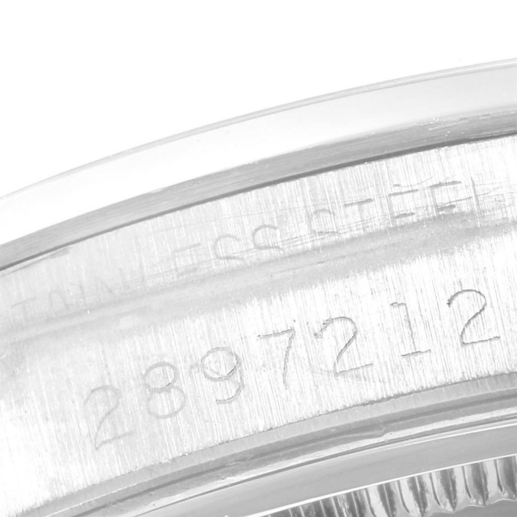 This image shows a close-up of the serial number engraving on the case of a Rolex Vintage Collection 6694 Men
s Stainless Steel Silver Dial 6694 Men
s Stainless Steel Silver Dial model watch.