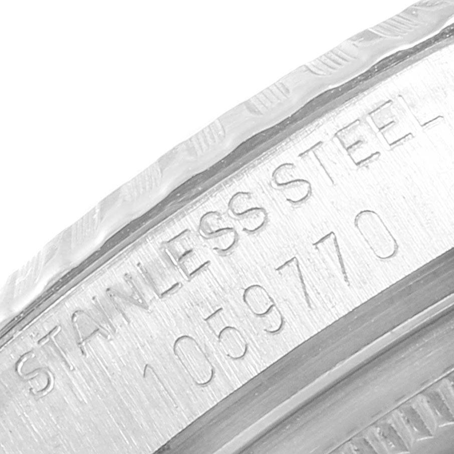 This image shows a close-up of the stainless steel casing with engravings on the Rolex Vintage Collection 1601 Men
s Stainless Steel Silver Dial 1601 Men
s Stainless Steel Silver Dial watch.