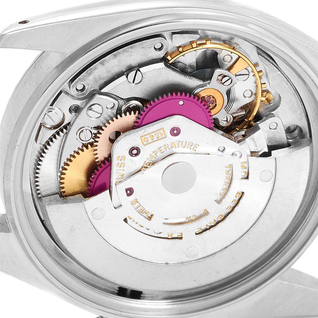 The image shows a close-up view of the inner mechanical movement components of a Rolex Vintage Collection 1601 Men
s Stainless Steel Silver Dial 1601 Men
s Stainless Steel Silver Dial watch.