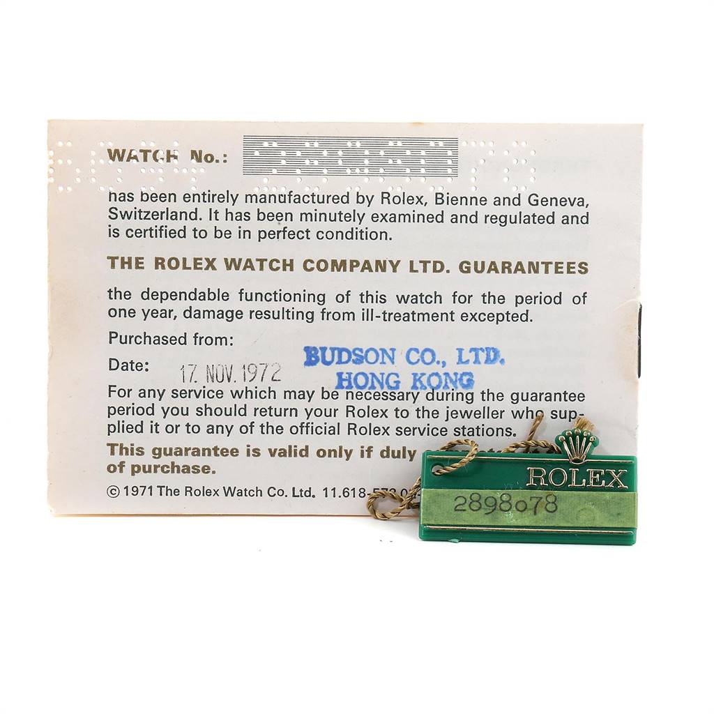 The image shows the guarantee card and tag for the Rolex Vintage Collection 6694 Men's Stainless Steel Grey Dial 6694 Men's Stainless Steel Grey Dial model watch.
