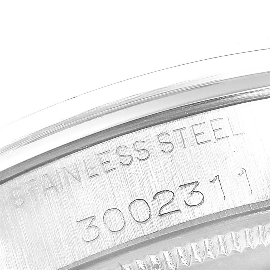 The image shows a close-up of the stainless steel back case of the Rolex Vintage Collection 5500 Men
s Stainless Steel Silver Dial 5500 Men
s Stainless Steel Silver Dial watch, displaying its serial number.