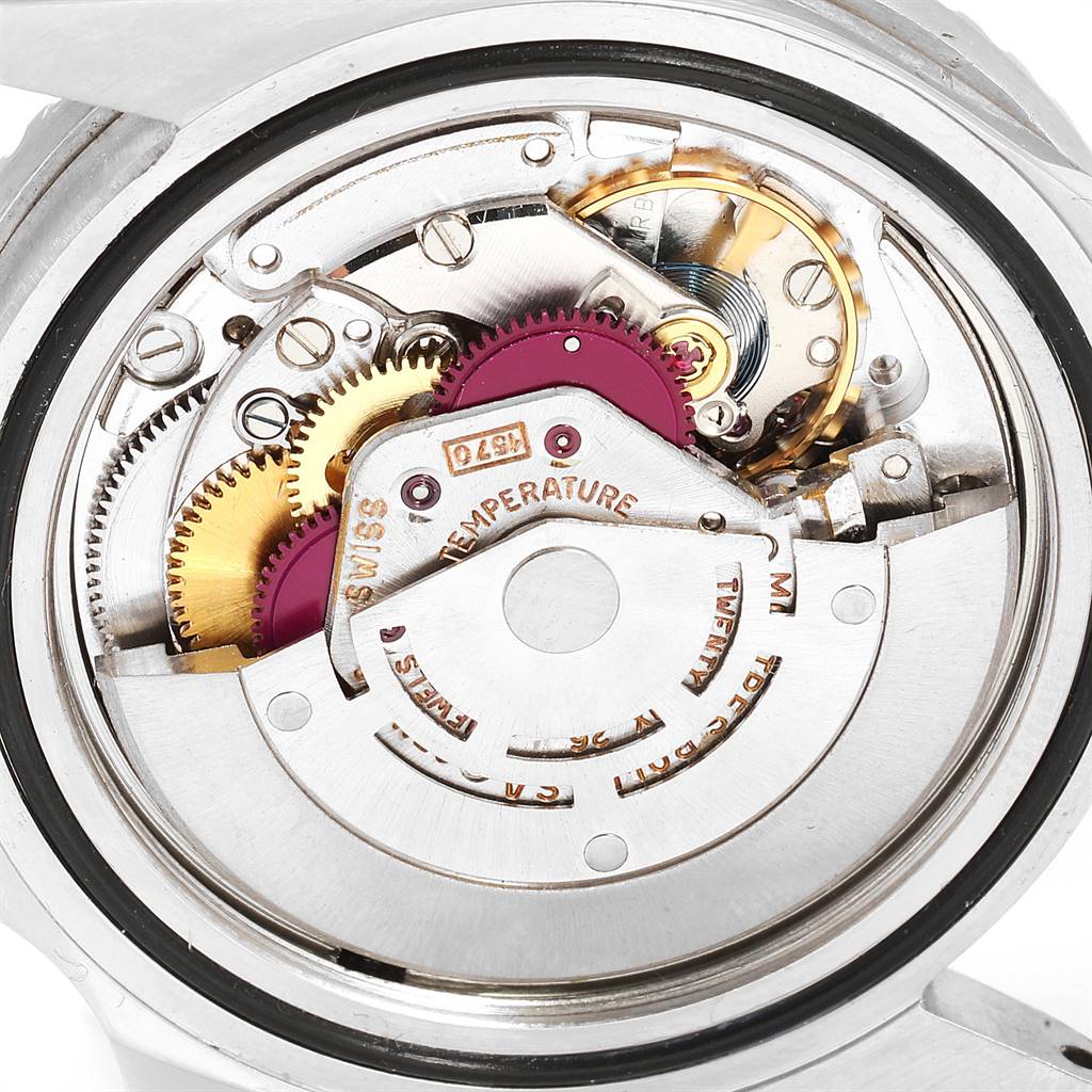 This image shows a close-up of the movement mechanism of the Rolex Vintage Collection 1675 Men
s Stainless Steel Black Dial 1675 Men
s Stainless Steel Black Dial watch.
