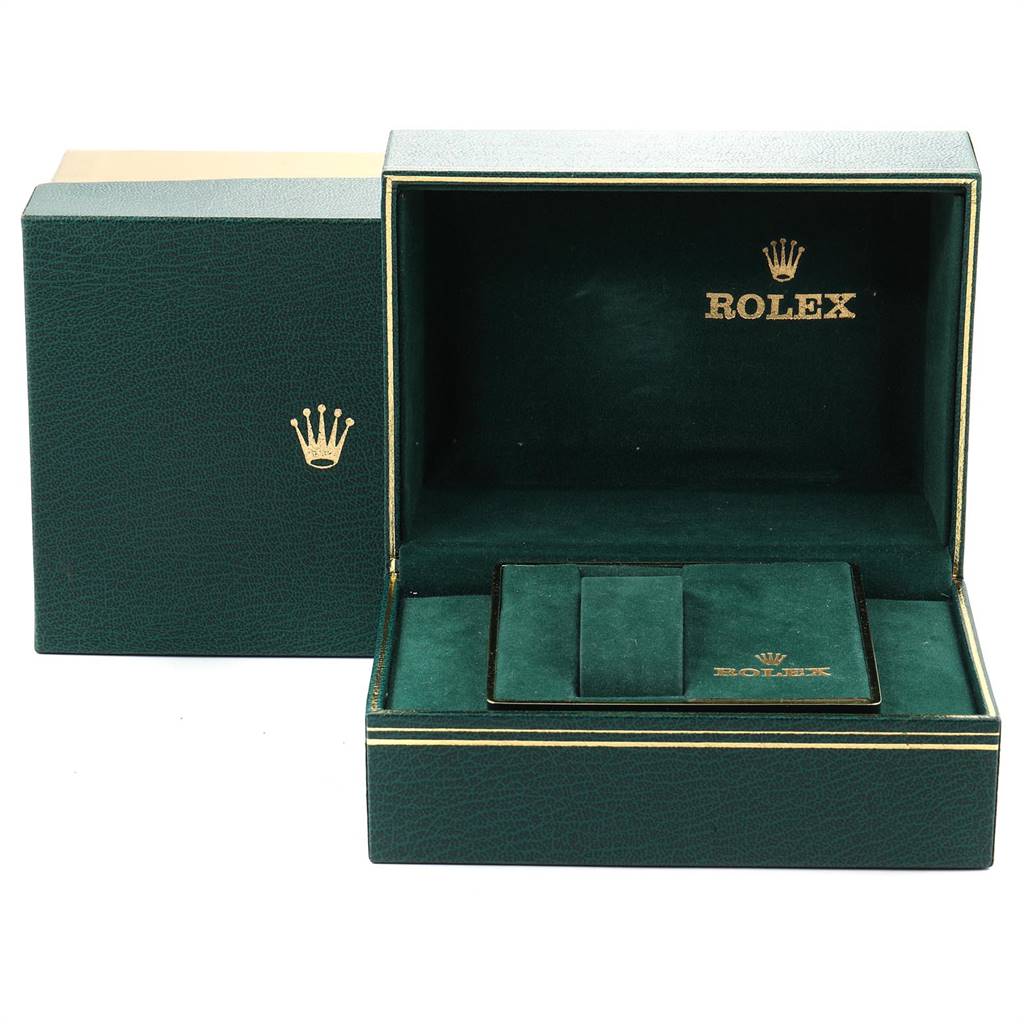The image shows an open green Rolex box from the Vintage Collection model, displaying the interior and exterior with gold branding.