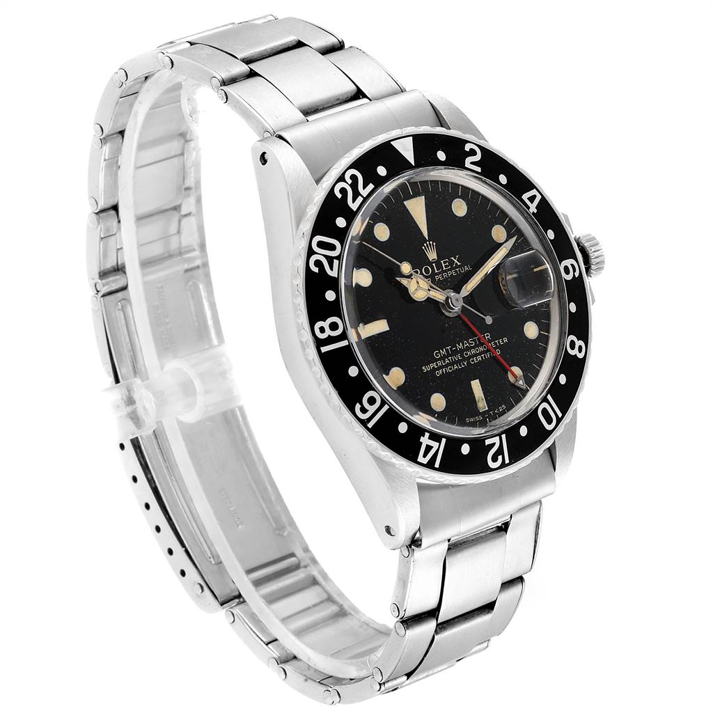 The image shows a side angle of a Rolex Vintage Collection 1675 Men
s Stainless Steel Black Dial 1675 Men
s Stainless Steel Black Dial GMT-Master watch, highlighting the face and metal bracelet.