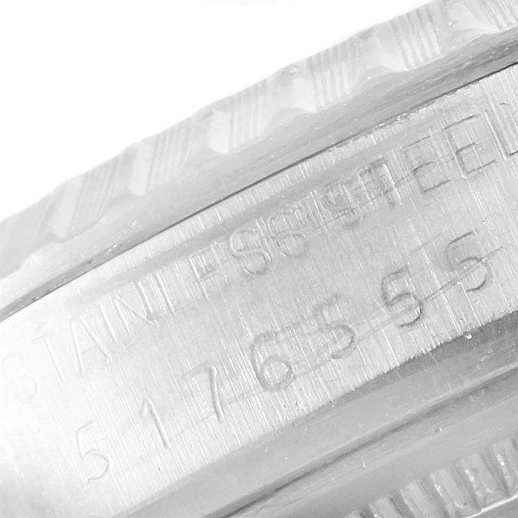 The image shows a close-up of the Stainless Steel casing with the serial number of a Rolex Vintage Collection 1603 Men
s Stainless Steel Brown Dial 1603 Men
s Stainless Steel Brown Dial watch.