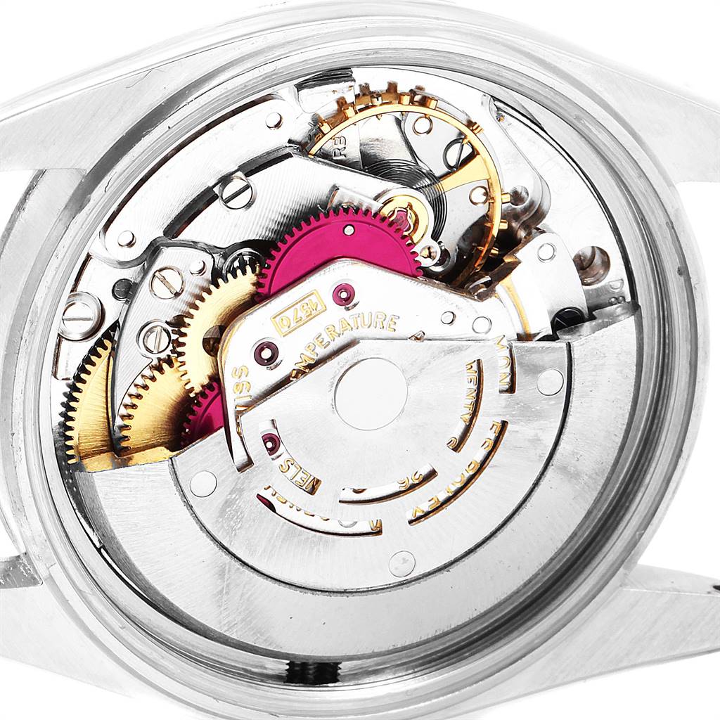 This image shows the inner mechanical movement of a Rolex Vintage Collection 1603 Men
s Stainless Steel Brown Dial 1603 Men
s Stainless Steel Brown Dial watch from a top-down angle.