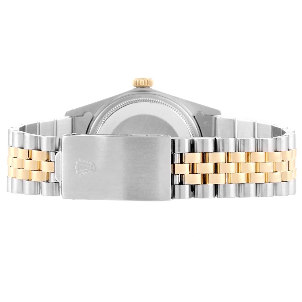 The image shows the back view of the Vintage Collection model by Rolex, highlighting the two-tone bracelet and clasp.