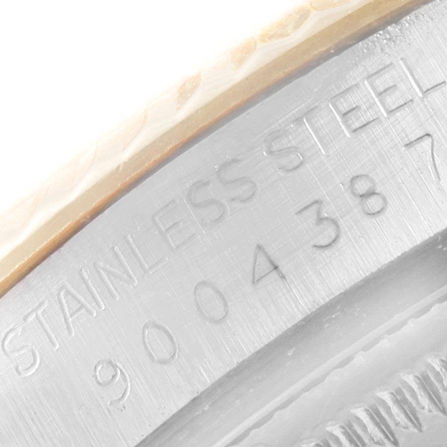 The close-up image shows the engraved stainless steel band and serial number of the Rolex Vintage Collection 16013 Men's Stainless Steel Champagne Dial 16013 Men's Stainless Steel Champagne Dial watch.