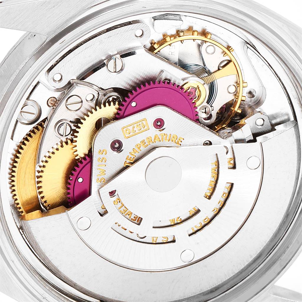 The image shows an internal top view of the movement and intricate mechanisms of a Rolex Vintage Collection 1603 Men
s Stainless Steel Silver Dial 1603 Men
s Stainless Steel Silver Dial watch.
