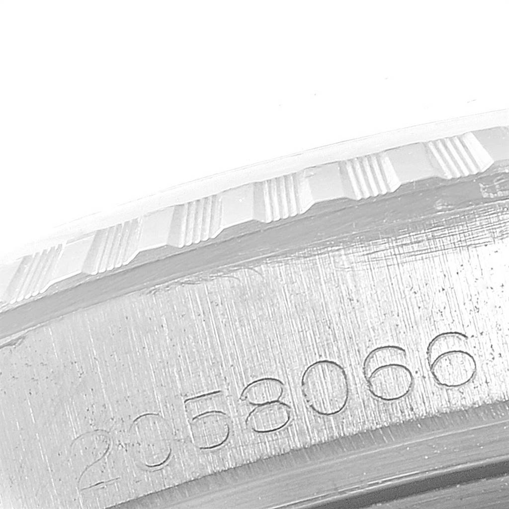 Close-up of the engraving on the bezel of a Rolex Vintage Collection 1603 Men
s Stainless Steel Silver Dial 1603 Men
s Stainless Steel Silver Dial watch, model number partially visible.