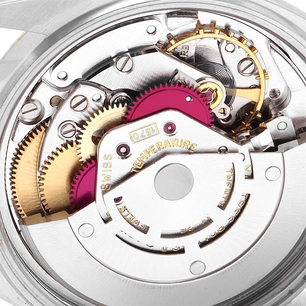 This image shows a close-up view of the movement mechanism of a Rolex Vintage Collection 1601 Men
s Steel and Gold (two tone) Champagne Dial 1601 Men
s Steel and Gold (two tone) Champagne Dial watch.