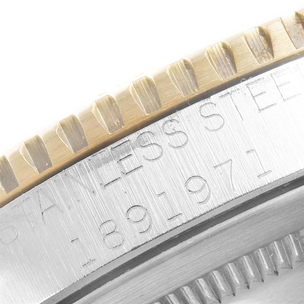 The image shows a close-up of the case side and bezel of a Rolex Vintage Collection 1625 Men
s Steel and Gold (two tone) Champagne Dial 1625 Men
s Steel and Gold (two tone) Champagne Dial watch, highlighting the stainless steel.