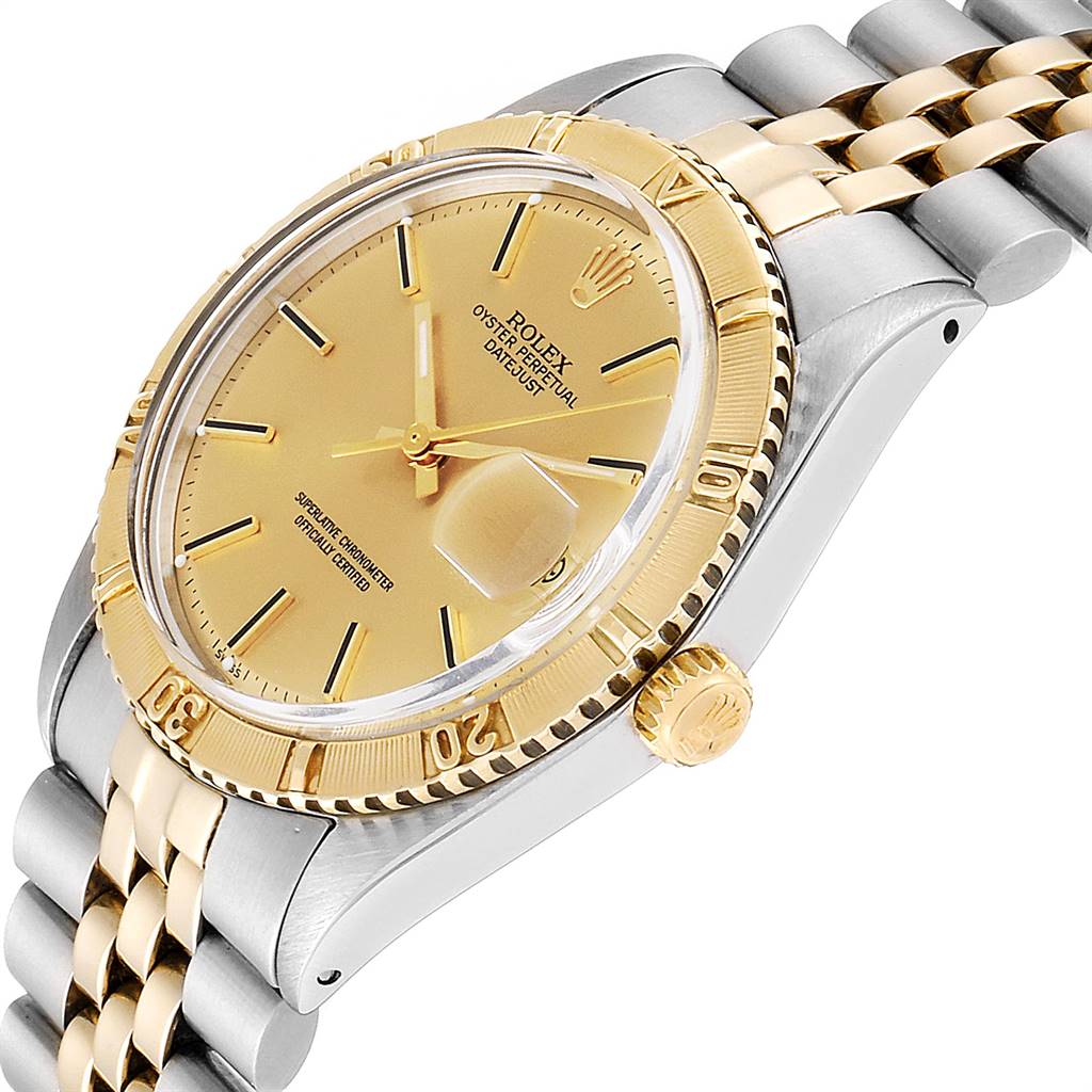 The image shows a Rolex Vintage Collection 1625 Men
s Steel and Gold (two tone) Champagne Dial 1625 Men
s Steel and Gold (two tone) Champagne Dial watch at a tilted angle, highlighting the golden bezel, dial, and partially the bracelet.