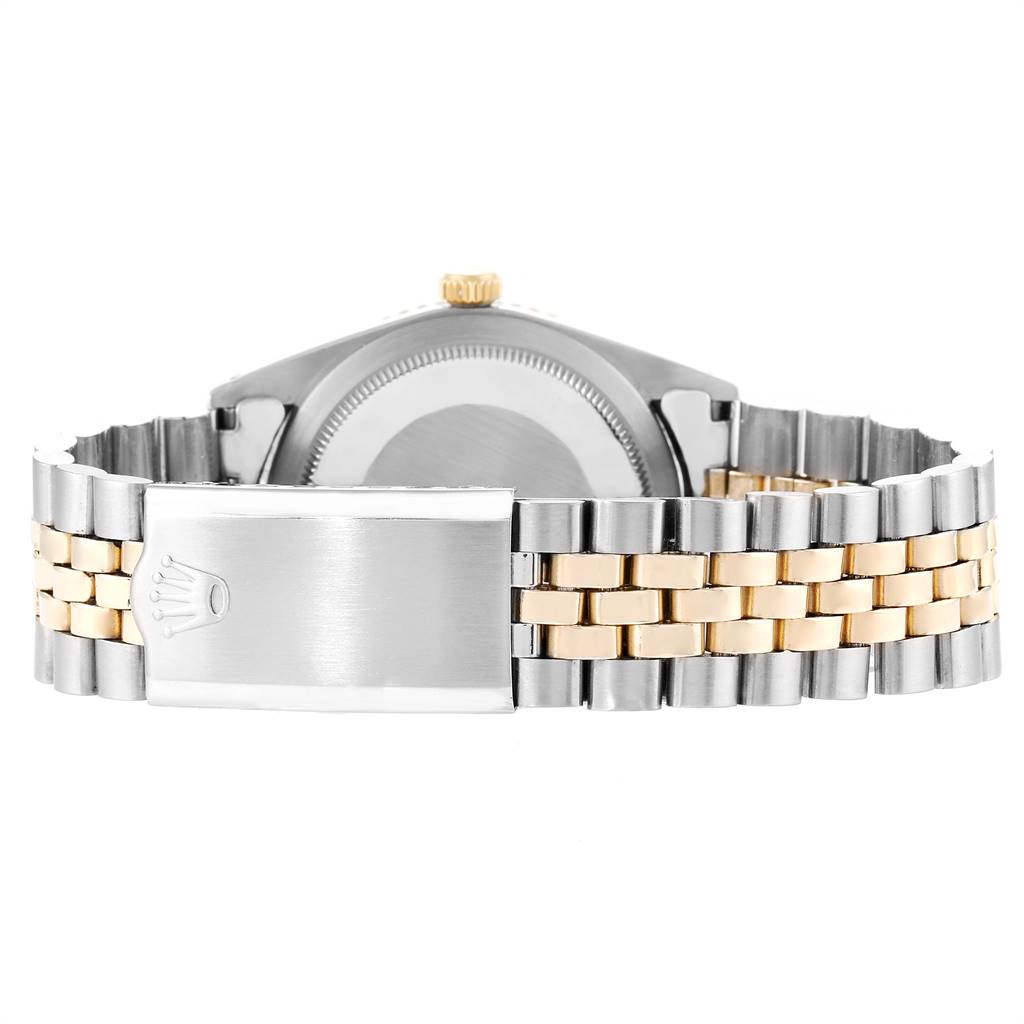 The image shows the back view of the case and the bracelet of a Vintage Collection Rolex watch.