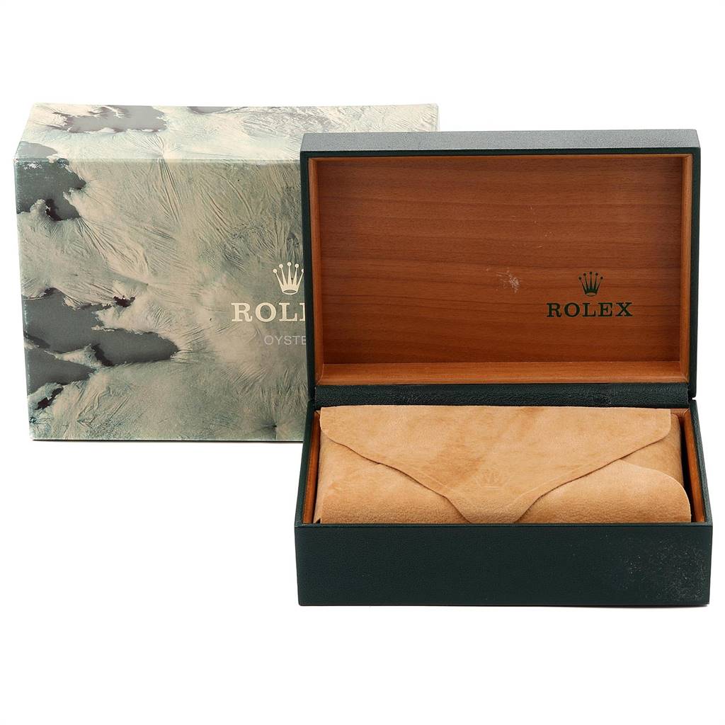 The image shows a Rolex Vintage Collection 16760 Men
s Stainless Steel Black Dial 16760 Men
s Stainless Steel Black Dial watch box and outer packaging, with the inner box opened to reveal a suede pouch.