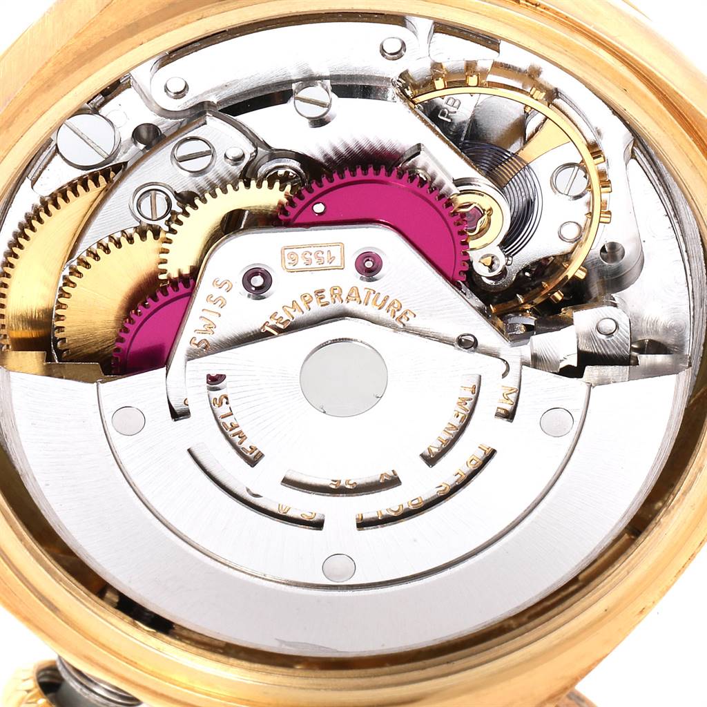 This image shows the intricate internal mechanism of the Vintage Collection Rolex watch, viewed from the back.