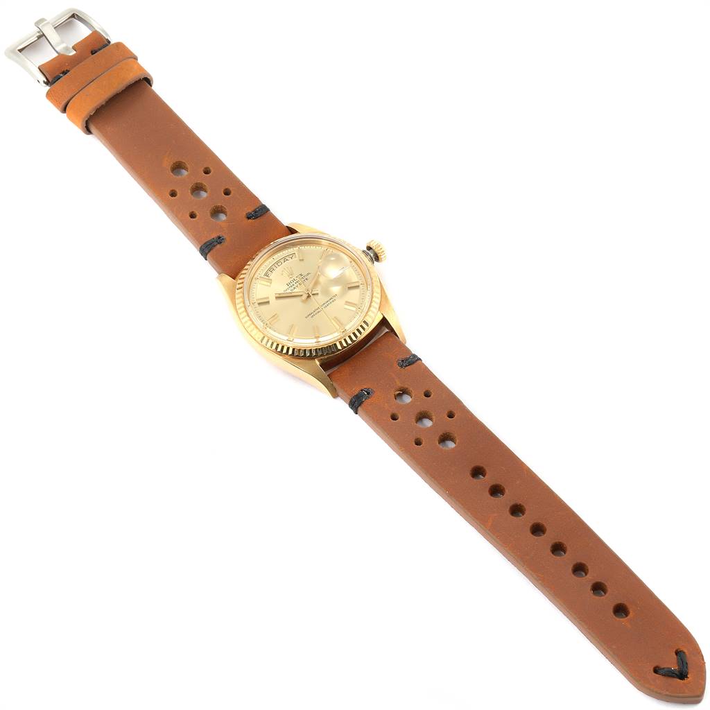 The image shows a Rolex Vintage Collection 1803 Men
s Yellow Gold Champagne Dial 1803 Men
s Yellow Gold Champagne Dial watch, viewed from above, including the face, bezel, crown, and brown leather strap.