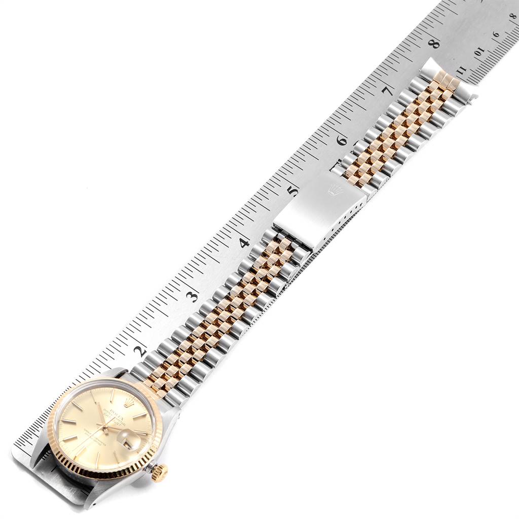 The Rolex Vintage Collection 16013 Men's Stainless Steel Champagne Dial 16013 Men's Stainless Steel Champagne Dial watch is shown from above, highlighting its dial, crown, and two-tone Jubilee bracelet.