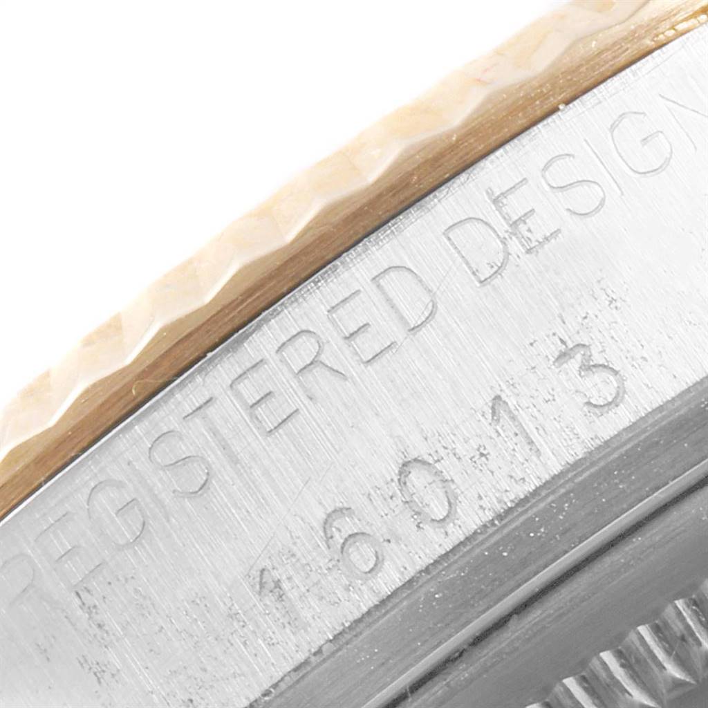 The image shows a close-up view of the bezel and case side of the Vintage Collection model by Rolex, highlighting engravings.