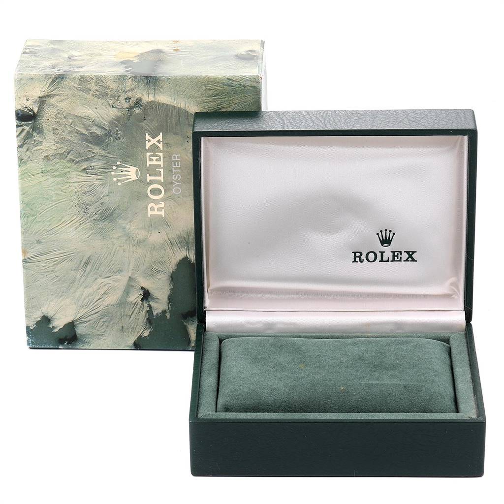 This is an open box for a Rolex Vintage Collection 16013 Men's Stainless Steel Champagne Dial 16013 Men's Stainless Steel Champagne Dial watch, showing the interior padding and exterior design.