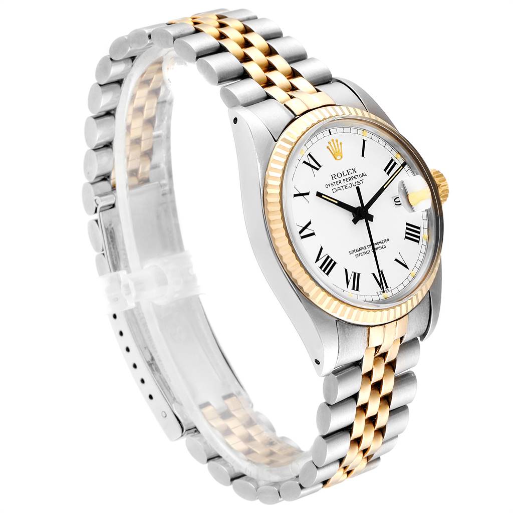 This image shows a Rolex Vintage Collection 16013 Men's Stainless Steel White Dial 16013 Men's Stainless Steel White Dial watch at an angled side view, displaying its gold and silver bracelet, white dial, and fluted bezel.