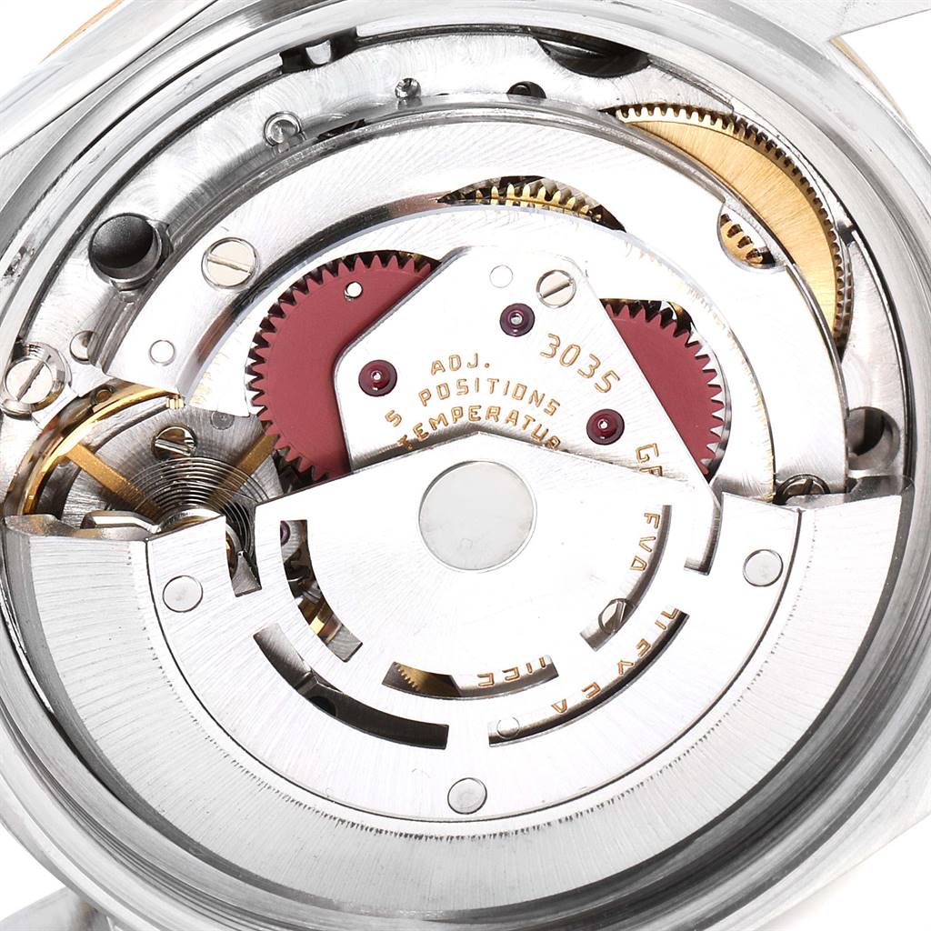 This image shows the intricate inner mechanics of the Rolex Vintage Collection 16013 Men's Stainless Steel Champagne Dial 16013 Men's Stainless Steel Champagne Dial watch model, highlighting its gears and movement parts.