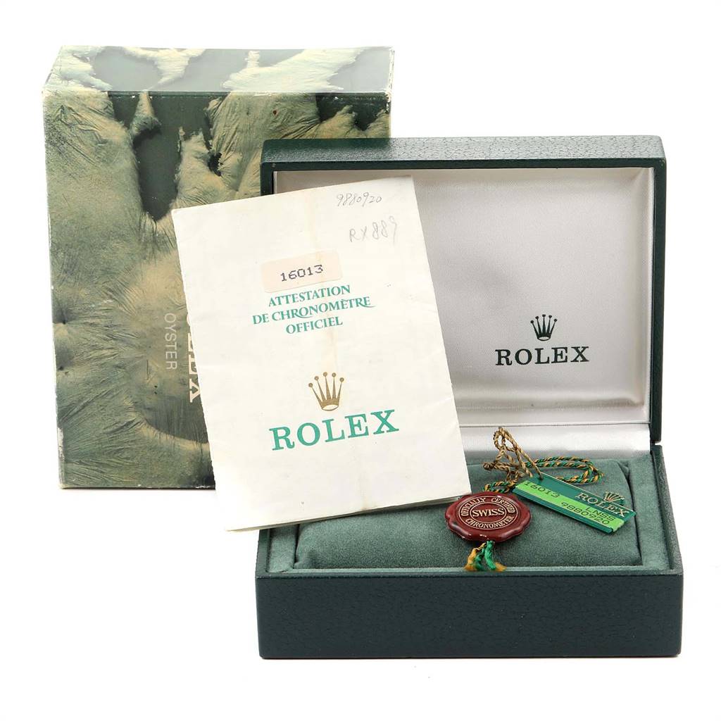 The image shows a Rolex Vintage Collection 16013 Men's Stainless Steel Champagne Dial 16013 Men's Stainless Steel Champagne Dial watch box, official chronometer certification, hang tags, and packaging, viewed from the front angle.