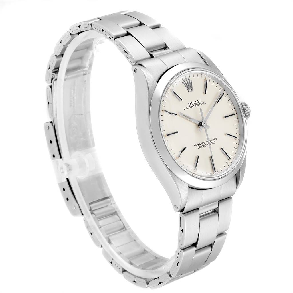 This image shows a Rolex Vintage Collection 1002 Men
s Stainless Steel Silver Dial 1002 Men
s Stainless Steel Silver Dial model watch from a right side angle, displaying the face, crown, and stainless steel bracelet.