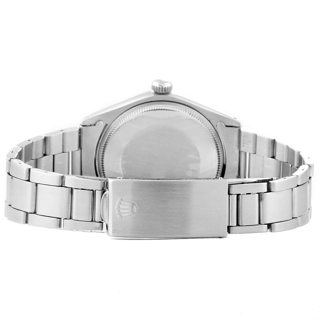 This image shows the back view of a Rolex Vintage Collection 1002 Men
s Stainless Steel Silver Dial 1002 Men
s Stainless Steel Silver Dial watch, highlighting the case back and bracelet clasp.