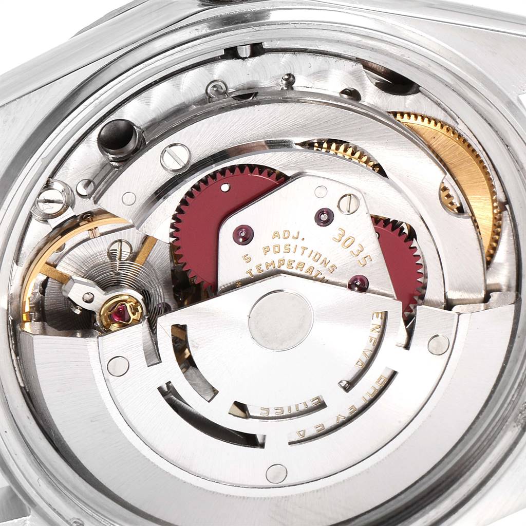 This image shows the inner mechanism of the Rolex Vintage Collection 16030 Men
s Stainless Steel Silver Dial 16030 Men
s Stainless Steel Silver Dial watch from a close-up angle, highlighting its gears and movement components.