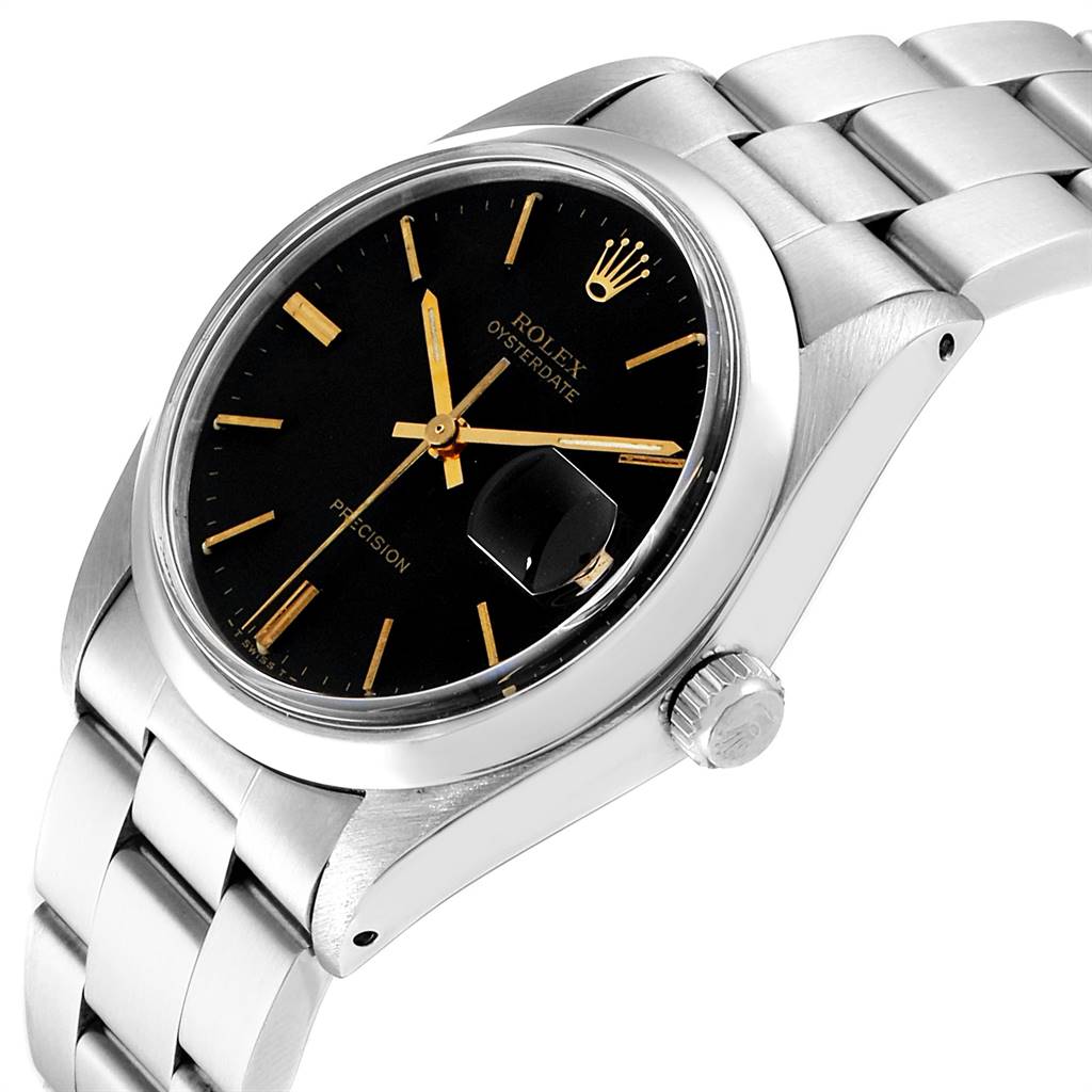 The Rolex Vintage Collection 6694 Men's Stainless Steel Black Dial 6694 Men's Stainless Steel Black Dial model watch is shown at a slight angle, featuring its black dial, gold indices, crown, and metal bracelet.