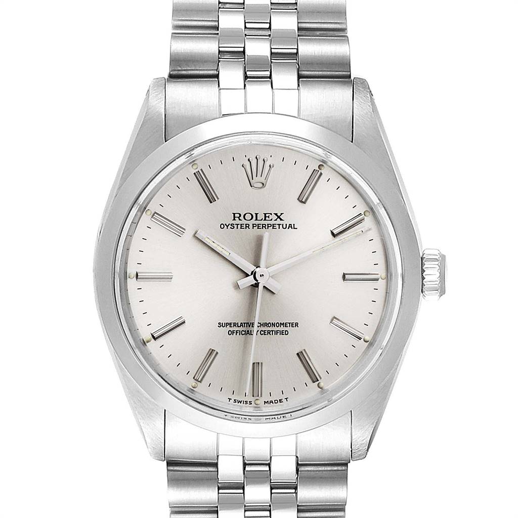 The image shows a front view of a Rolex Oyster Perpetual Vintage Collection watch, highlighting its dial, bezel, and bracelet.