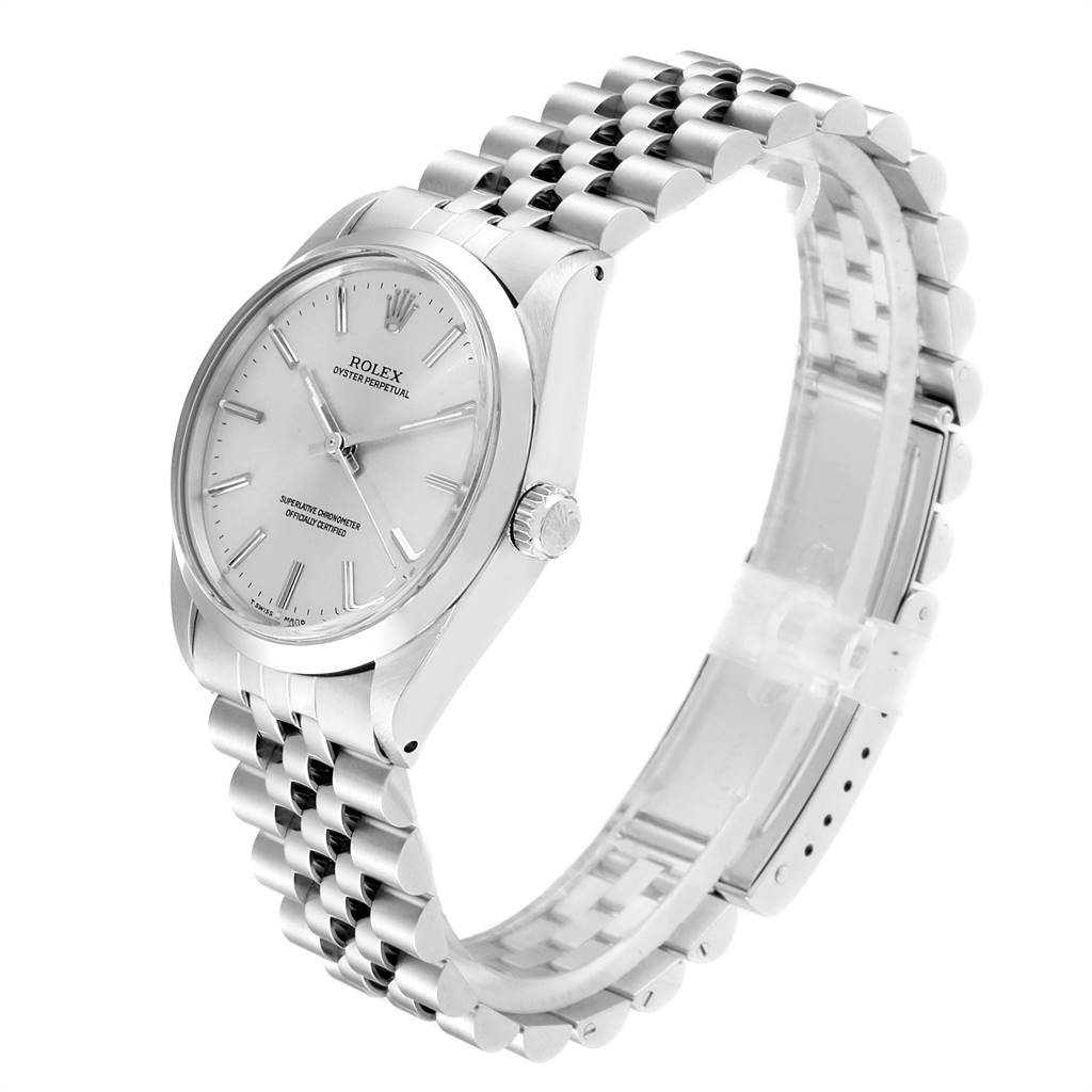 The Rolex Vintage Collection 1002 Men
s Stainless Steel Silver Dial 1002 Men
s Stainless Steel Silver Dial watch is shown from an angled side view, highlighting the case, dial, and bracelet.