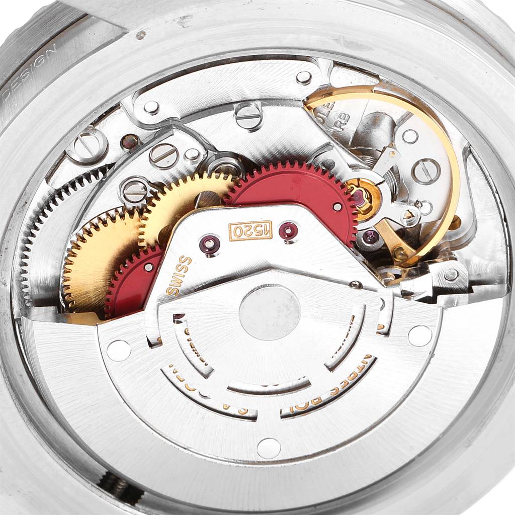 The image shows an internal view of the Rolex Vintage Collection 5513 Men
s Stainless Steel Black Dial 5513 Men
s Stainless Steel Black Dial model, highlighting the gears and movement mechanism.