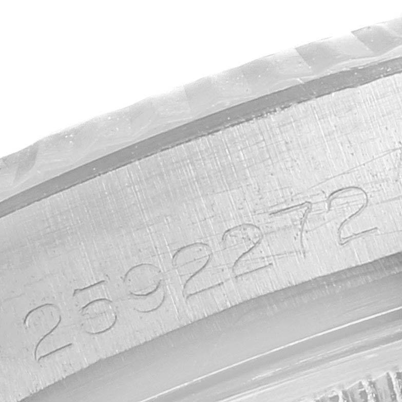 This image shows a close-up of the serial number engraved on the case of a Vintage Collection model by Rolex.