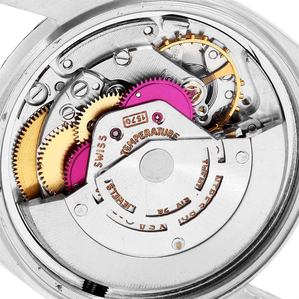 This image shows a close-up view of the internal movement mechanism of a Rolex Vintage Collection 1601 Men
s Stainless Steel Silver Dial 1601 Men
s Stainless Steel Silver Dial model watch.