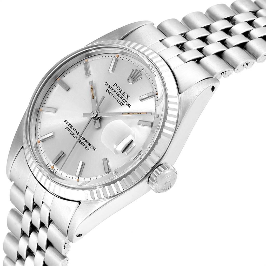 The image shows a Rolex Vintage Collection 1601 Men
s Stainless Steel Silver Dial 1601 Men
s Stainless Steel Silver Dial model at a three-quarter angle displaying the face, crown, and part of the bracelet.