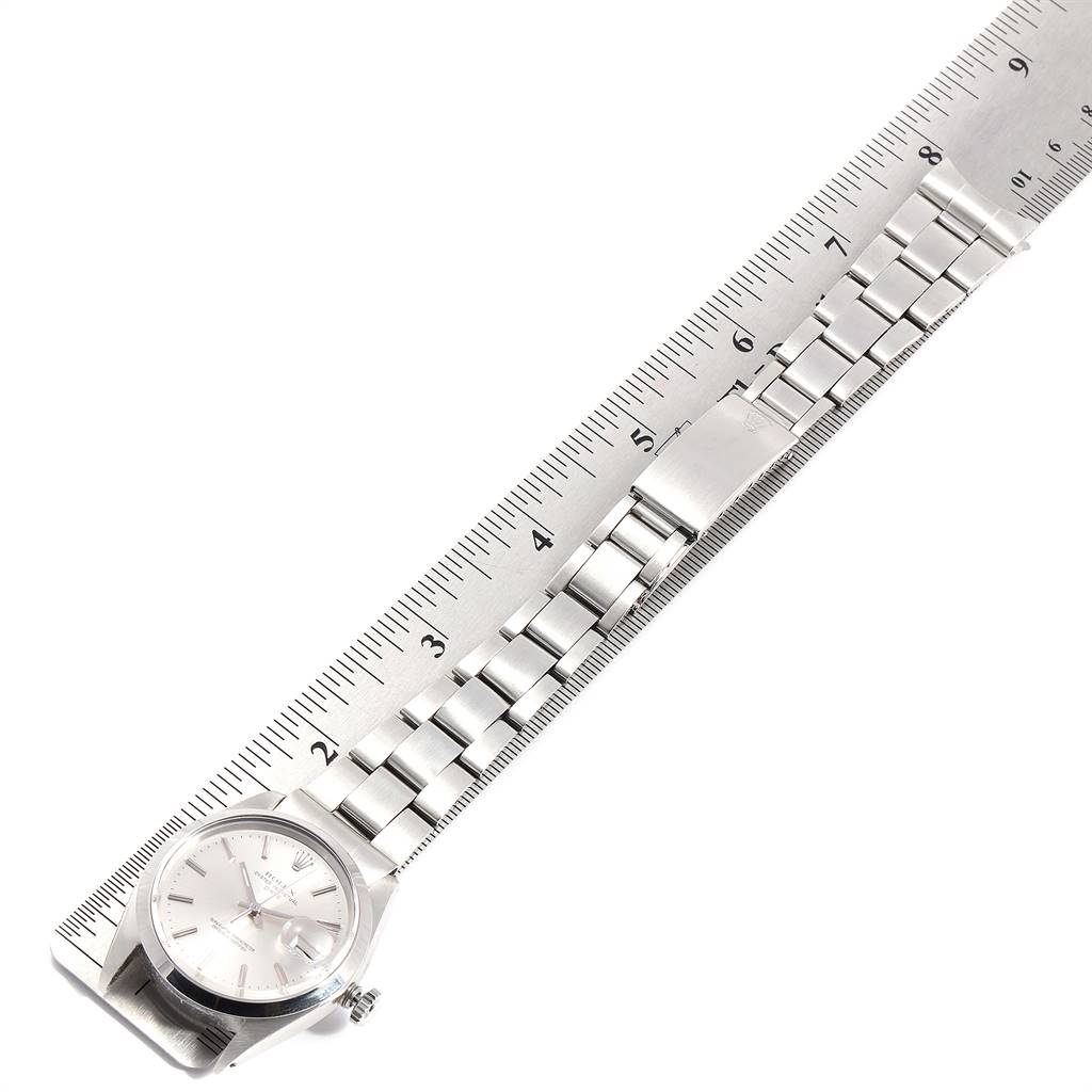 The image shows a Vintage Collection model Rolex watch horizontally measured against a ruler, displaying the dial and bracelet.