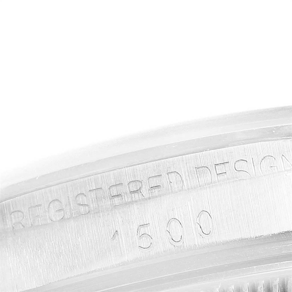 The close-up image shows the "REGISTERED DESIGN 1500" engraving on the side of the Rolex Vintage Collection 1500 Men
s Stainless Steel Silver Dial 1500 Men
s Stainless Steel Silver Dial watch case.
