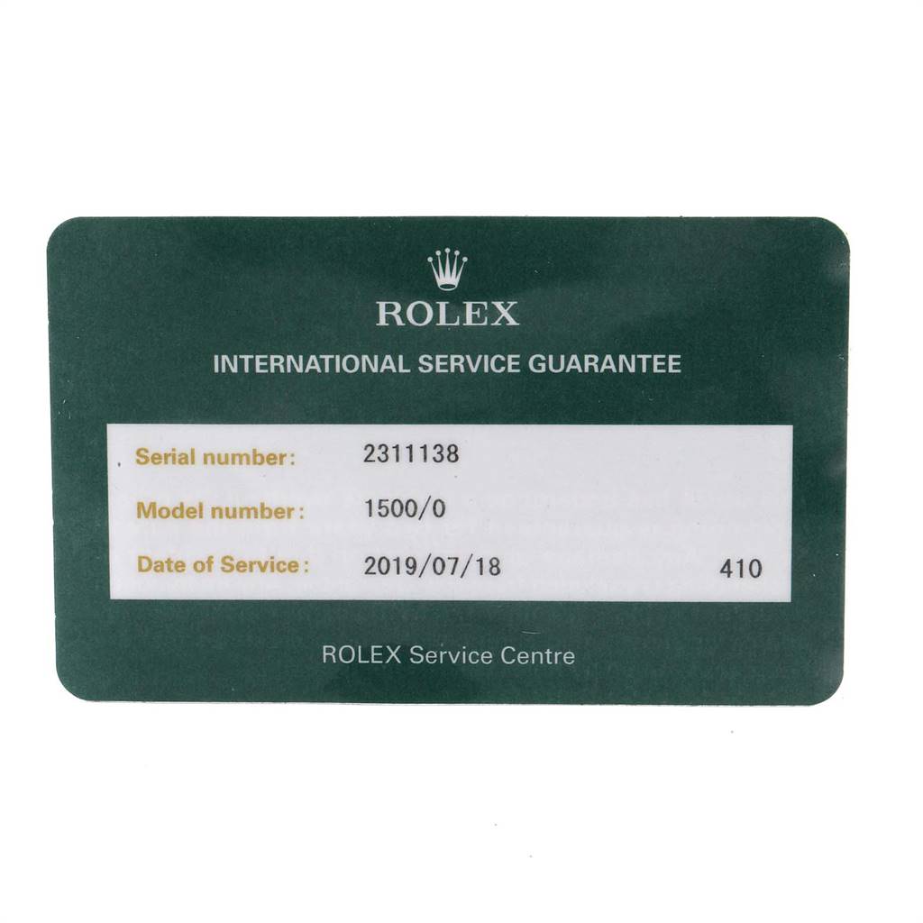 The image shows a Rolex International Service Guarantee card for the Vintage Collection model, with the serial number, model number, and service date.