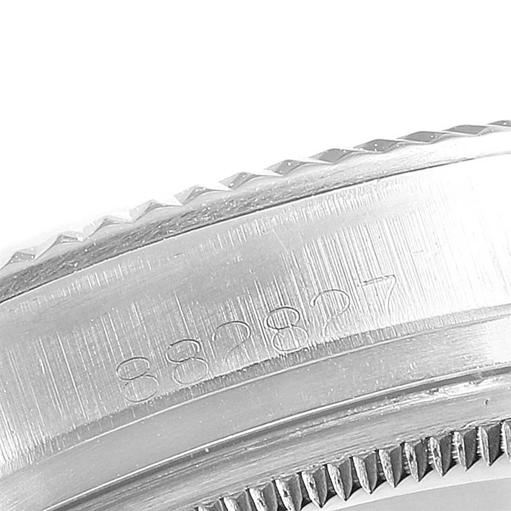 This is a close-up image showing the side of the bezel and case edge of a Rolex Vintage Collection 1601 Men
s Stainless Steel Silver Dial 1601 Men
s Stainless Steel Silver Dial model watch.