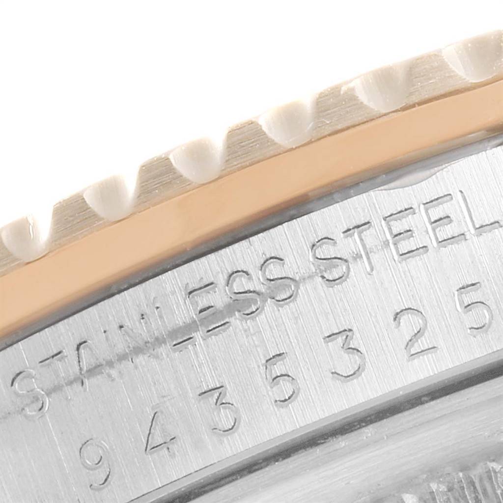 The image shows a close-up angle of the bezel and surrounding stainless steel caseback of the Rolex Vintage Collection 16753 Men's Steel and Gold (two tone) Black Dial 16753 Men's Steel and Gold (two tone) Black Dial model.